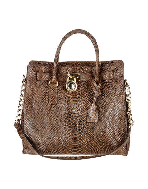 michael kors handbags brown and black|michael kors brown leather handbag.